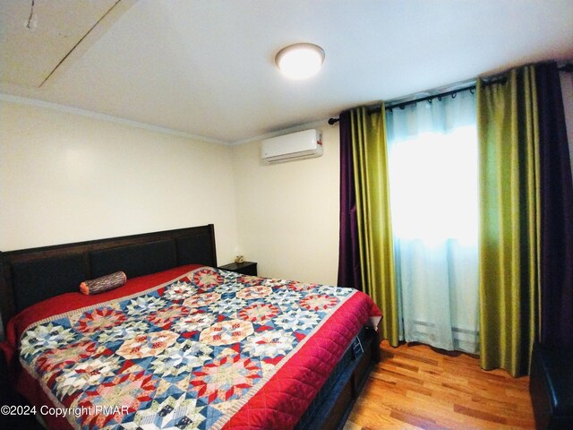 bedroom featuring wood-type flooring