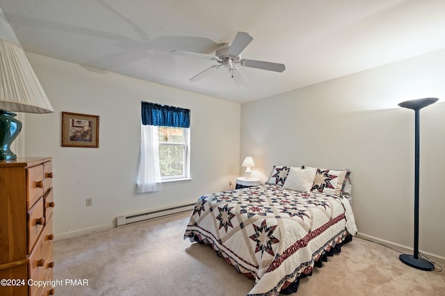 bedroom with ceiling fan, light carpet, and baseboard heating