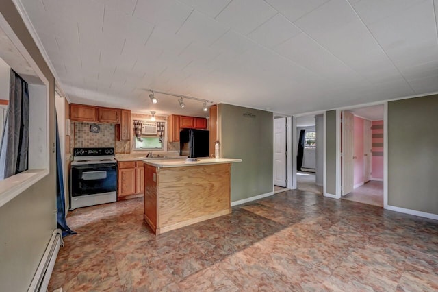 159 Sandstone Dr, Dingmans Ferry, PA 18328 - kitchen featuring electric range, freestanding refrigerator, a baseboard heating unit, light countertops, and decorative backsplash