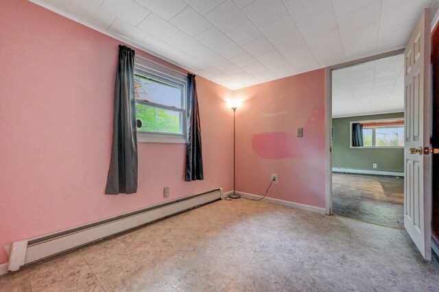 159 Sandstone Dr, Dingmans Ferry, PA 18328 - empty room with a baseboard radiator, plenty of natural light, baseboard heating, and baseboards