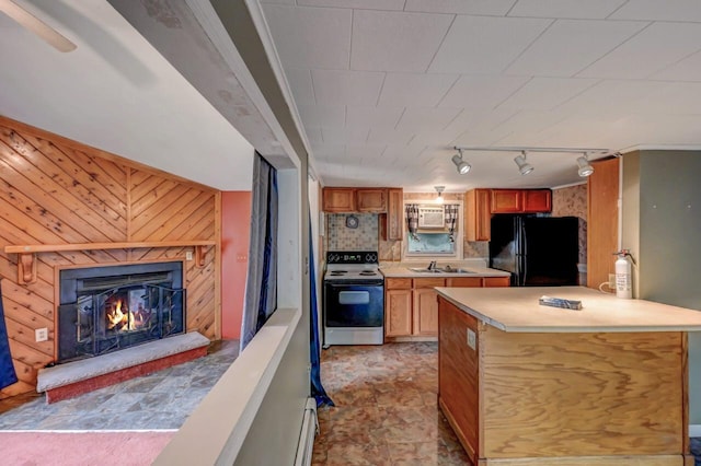 159 Sandstone Dr, Dingmans Ferry, PA 18328 - kitchen with freestanding refrigerator, electric range oven, a sink, rail lighting, and light countertops