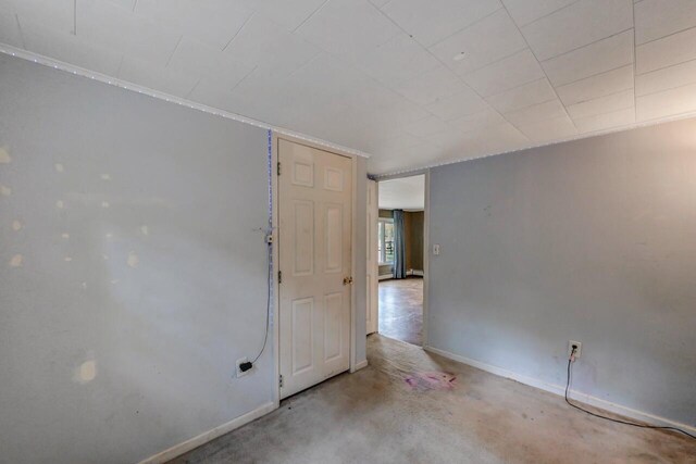 159 Sandstone Dr, Dingmans Ferry, PA 18328 - unfurnished room with baseboards and concrete flooring