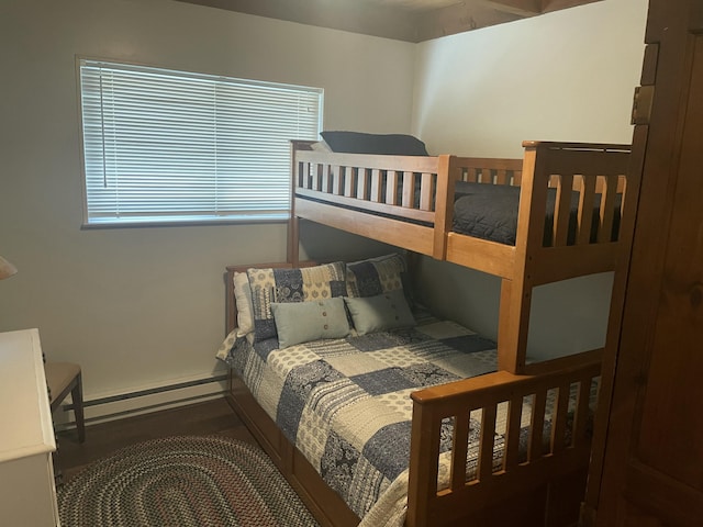 1515 Beech Spring Dr, Pocono Pines, PA 18350 - bedroom featuring a baseboard heating unit, wood finished floors, and baseboards