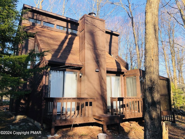 1148 Country Place Dr, Tobyhanna, PA 18466 - back of house featuring a deck and a chimney