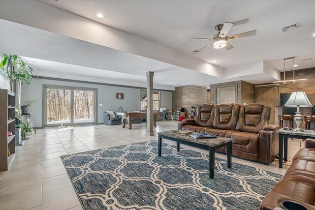 115 Ridgewood Ln, Hawley, PA 18428 - living room with a ceiling fan, tile patterned floors, decorative columns, healthy amount of natural light, and recessed lighting