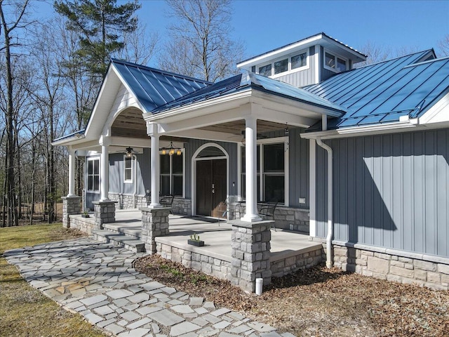 115 Ridgewood Ln, Hawley, PA 18428 - view of front facade featuring covered porch, a standing seam roof, a ceiling fan, and metal roof
