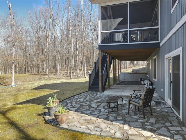 115 Ridgewood Ln, Hawley, PA 18428 - view of patio featuring stairway and a sunroom