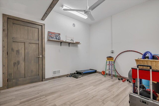 115 Ridgewood Ln, Hawley, PA 18428 - exercise area with light wood-style flooring, ceiling fan, and baseboards