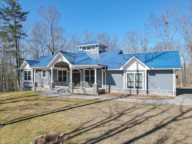 115 Ridgewood Ln, Hawley, PA 18428 - view of front of property with covered porch, a standing seam roof, metal roof, and a front yard
