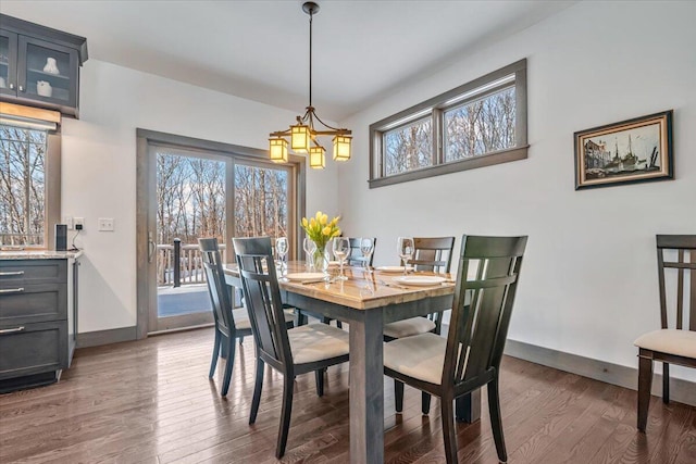 115 Ridgewood Ln, Hawley, PA 18428 - dining space featuring baseboards and wood finished floors