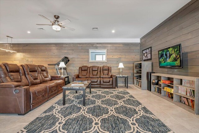 115 Ridgewood Ln, Hawley, PA 18428 - living area with wooden walls, tile patterned floors, ceiling fan, and recessed lighting