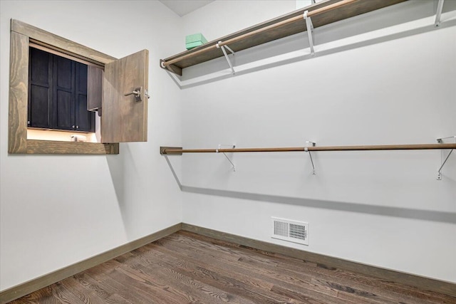 115 Ridgewood Ln, Hawley, PA 18428 - spacious closet with dark wood finished floors