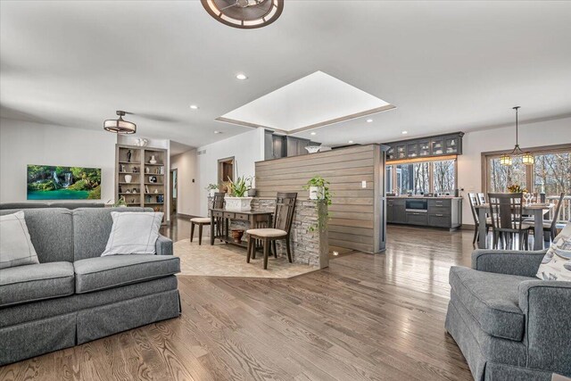 115 Ridgewood Ln, Hawley, PA 18428 - living room featuring wood finished floors, recessed lighting, and a chandelier