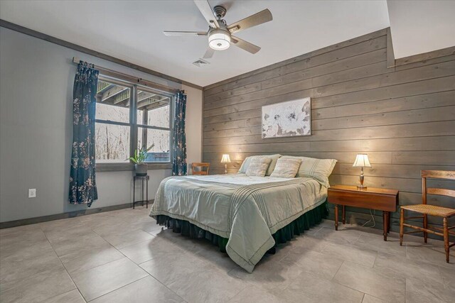 115 Ridgewood Ln, Hawley, PA 18428 - bedroom with wood walls, a ceiling fan, and baseboards
