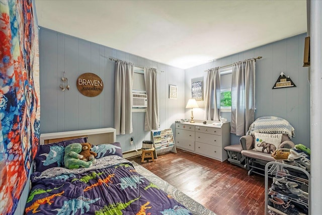 105 Beaver Ln, East Stroudsburg, PA 18301 - bedroom featuring wood finished floors, a baseboard radiator, and cooling unit