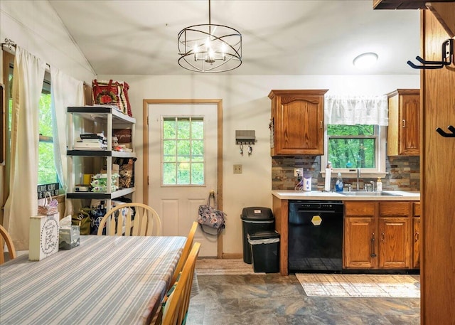105 Beaver Ln, East Stroudsburg, PA 18301 - kitchen featuring dishwasher, a sink, tasteful backsplash, a chandelier, and brown cabinets