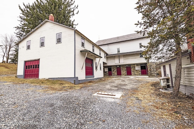 view of property exterior with a garage