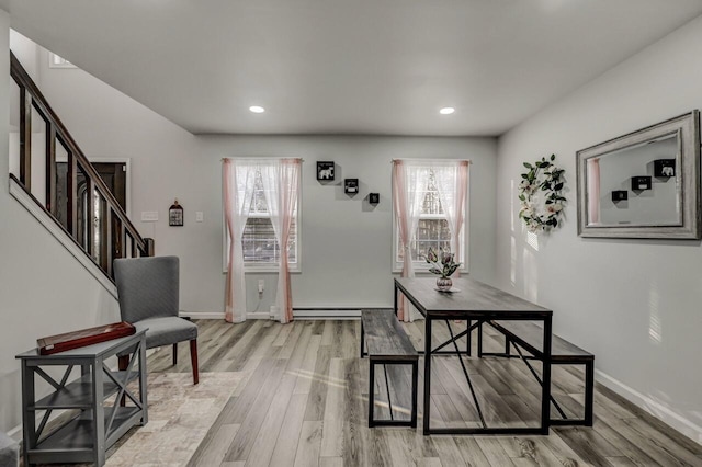 foyer featuring recessed lighting, light wood-type flooring, baseboards, and stairway