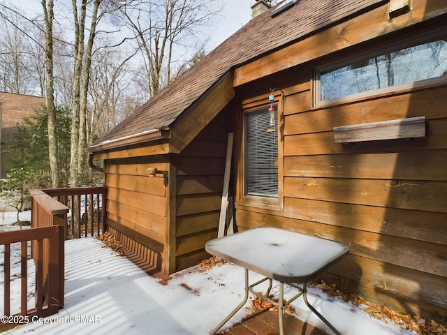 view of snow covered deck