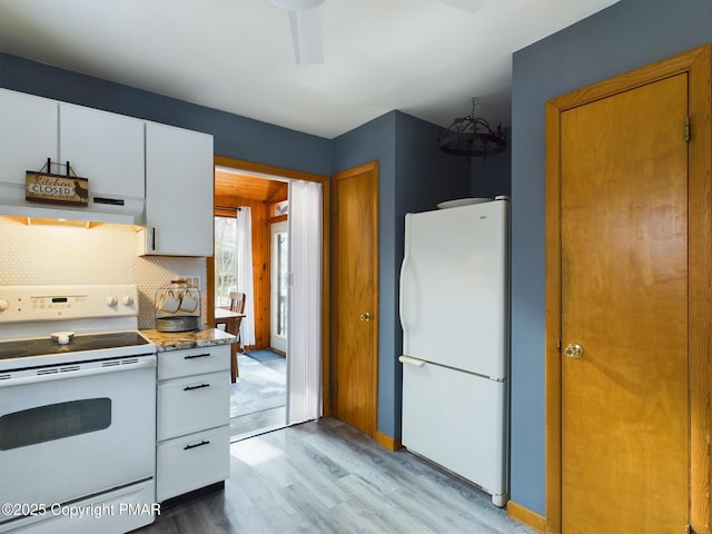 kitchen with white cabinetry, white appliances, tasteful backsplash, and light hardwood / wood-style floors