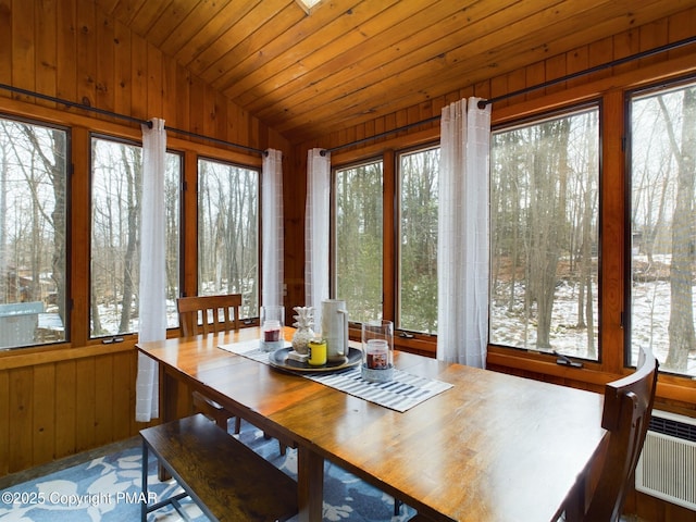 sunroom / solarium with wood ceiling and vaulted ceiling