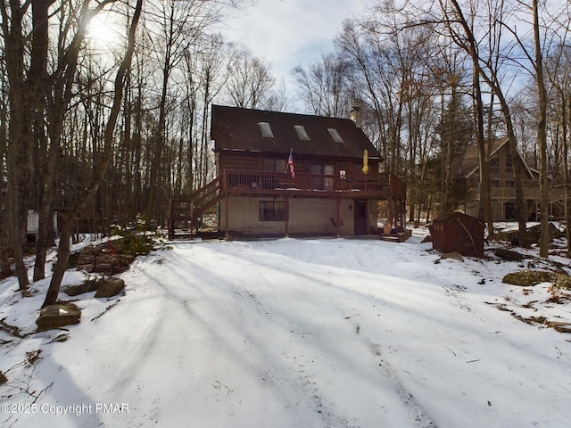 view of front of house with a deck