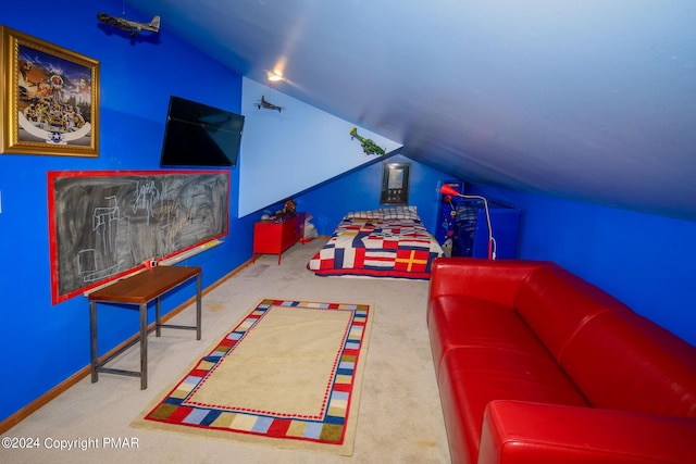 recreation room with baseboards, carpet, and lofted ceiling