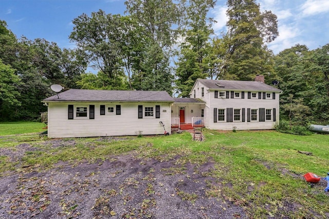 325 Mt Nebo Rd, East Stroudsburg, PA 18301 - view of front facade featuring a chimney and a front yard