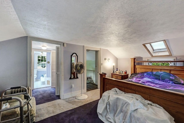 325 Mt Nebo Rd, East Stroudsburg, PA 18301 - bedroom with a textured ceiling, a skylight, carpet, and vaulted ceiling