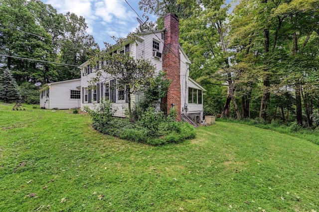 325 Mt Nebo Rd, East Stroudsburg, PA 18301 - view of home's exterior with a chimney, a lawn, and cooling unit
