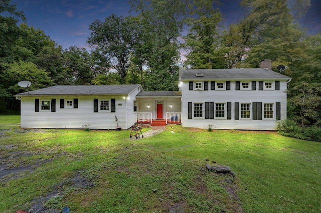 325 Mt Nebo Rd, East Stroudsburg, PA 18301 - view of front of home with a chimney and a front lawn