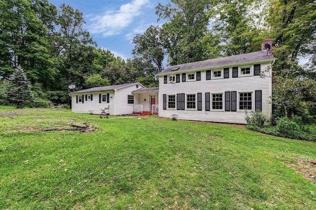 325 Mt Nebo Rd, East Stroudsburg, PA 18301 - view of front of house featuring a chimney and a front yard