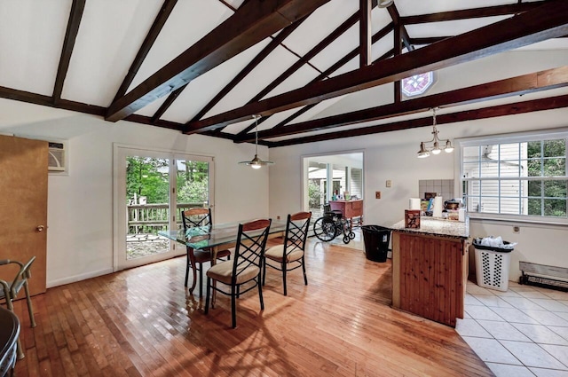 325 Mt Nebo Rd, East Stroudsburg, PA 18301 - dining space with a chandelier, a wall unit AC, and light wood-style floors