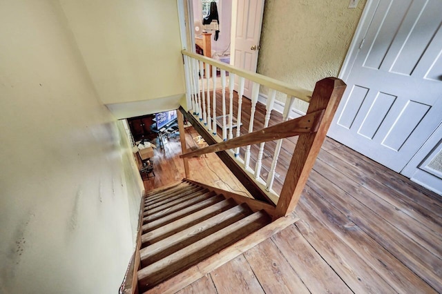 325 Mt Nebo Rd, East Stroudsburg, PA 18301 - staircase with hardwood / wood-style floors and a textured wall