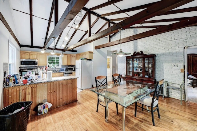 325 Mt Nebo Rd, East Stroudsburg, PA 18301 - dining room featuring brick wall, light wood-style floors, beamed ceiling, and high vaulted ceiling