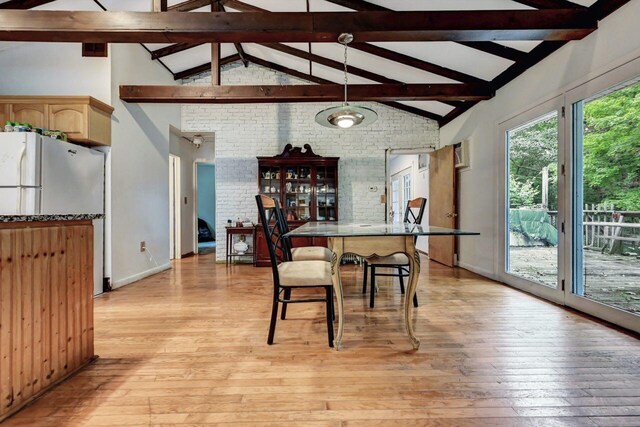 325 Mt Nebo Rd, East Stroudsburg, PA 18301 - dining space featuring light wood-style floors, beam ceiling, high vaulted ceiling, and brick wall