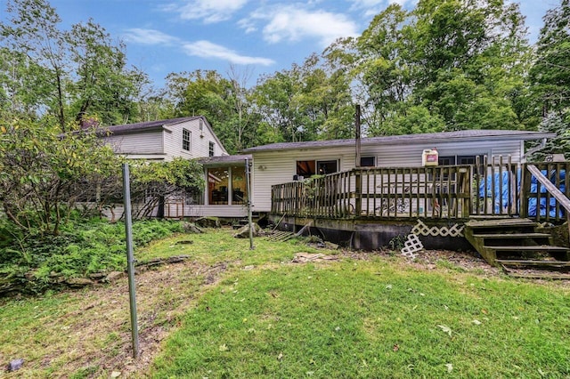 325 Mt Nebo Rd, East Stroudsburg, PA 18301 - rear view of house with a wooden deck and a yard