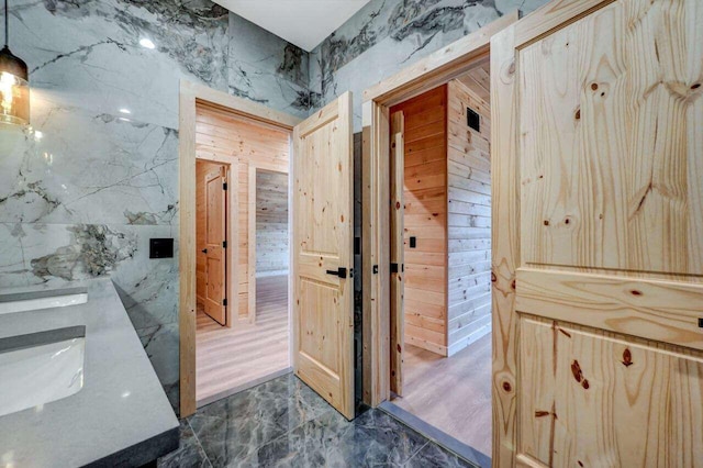 4142 Calendula Ct, Pocono Pines, PA 18350 - bathroom featuring marble tiled floors and double vanity