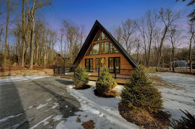 4142 Calendula Ct, Pocono Pines, PA 18350 - a-frame home featuring a wooden deck and french doors
