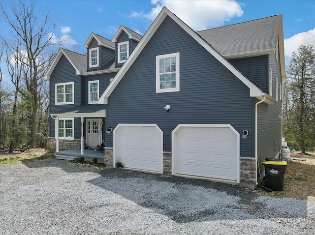 116 Red Bud Ln, Kunkletown, PA 18058 - view of front of house with a garage, stone siding, and driveway