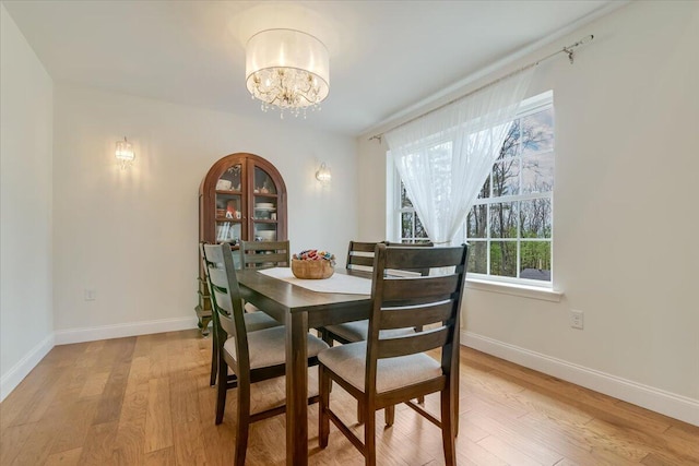 116 Red Bud Ln, Kunkletown, PA 18058 - dining area with light wood-style floors and a chandelier