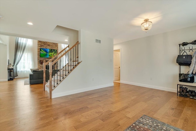 116 Red Bud Ln, Kunkletown, PA 18058 - unfurnished living room featuring stairs, light wood-style flooring, and recessed lighting