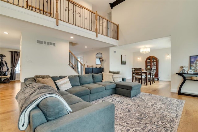 116 Red Bud Ln, Kunkletown, PA 18058 - living room featuring a high ceiling, wood finished floors, stairs, and recessed lighting
