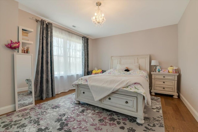 116 Red Bud Ln, Kunkletown, PA 18058 - bedroom with wood finished floors and a chandelier
