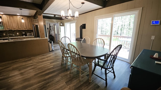 1196 Redwood Ter, Pocono Pines, PA 18350 - dining area featuring beamed ceiling, dark wood-type flooring, healthy amount of natural light, a chandelier, and wood ceiling