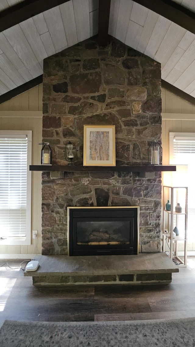 1196 Redwood Ter, Pocono Pines, PA 18350 - detailed view of wooden ceiling, a stone fireplace, wood finished floors, beamed ceiling, and wooden walls