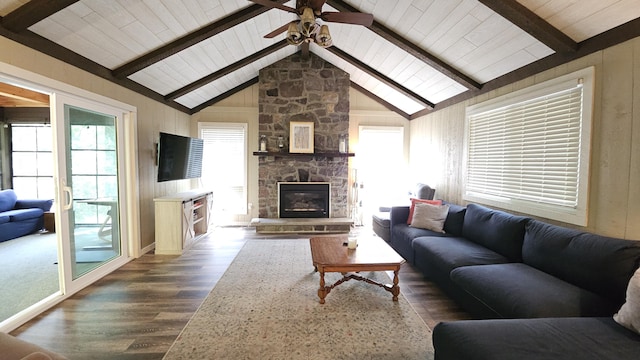 1196 Redwood Ter, Pocono Pines, PA 18350 - living area featuring a ceiling fan, dark wood-style flooring, a stone fireplace, wood walls, and wooden ceiling