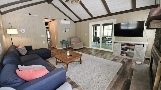 1196 Redwood Ter, Pocono Pines, PA 18350 - living area featuring a wall mounted air conditioner, dark wood-type flooring, wood walls, and a ceiling fan