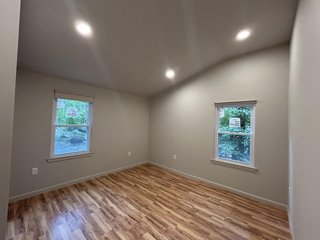 113 Netcong Cir, Pocono Lake, PA 18347 - spare room with vaulted ceiling, light wood finished floors, and recessed lighting