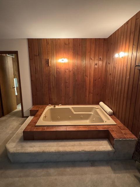 122 Sawmill Rd, Pocono Lake, PA 18347 - full bath featuring a jetted tub and wooden walls